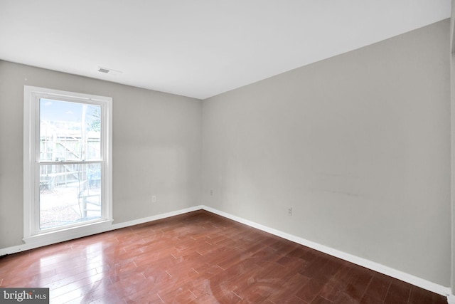 2904 11th St NW, Washington, DC 20001 - spare room with visible vents, wood finished floors, and baseboards