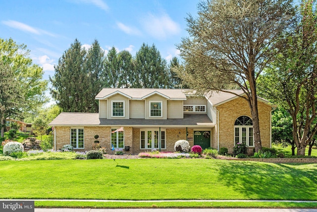 3672 Cimmeron Rd, York, PA 17402 - exterior space with a lawn and brick siding