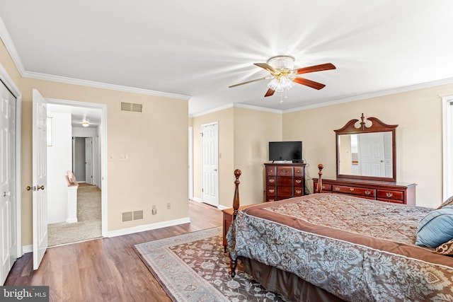 3672 Cimmeron Rd, York, PA 17402 - bedroom with crown molding, visible vents, wood finished floors, and baseboards