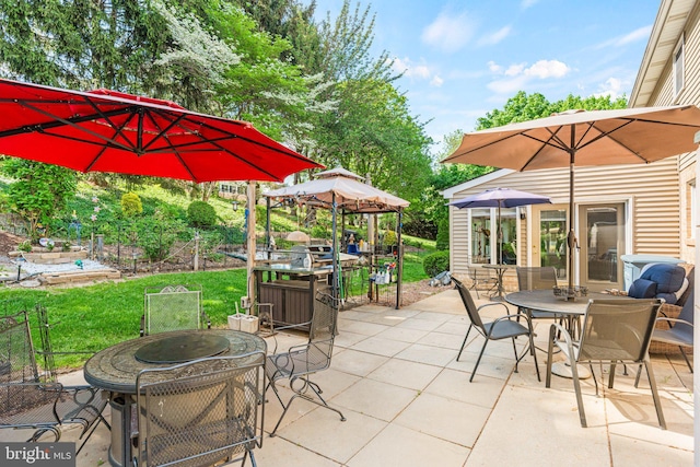3672 Cimmeron Rd, York, PA 17402 - view of patio with an outdoor fire pit, a gazebo, and outdoor dining area