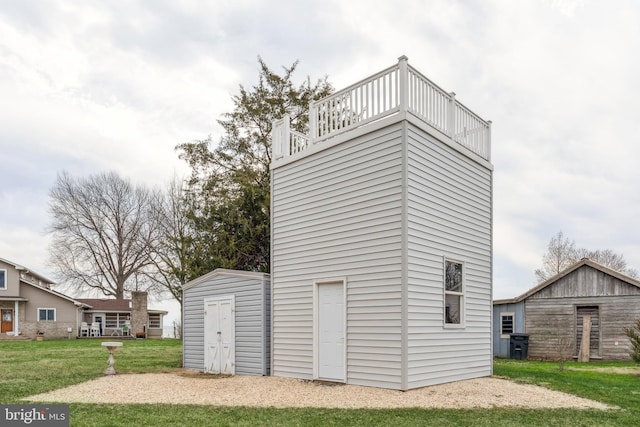 garage featuring a shed