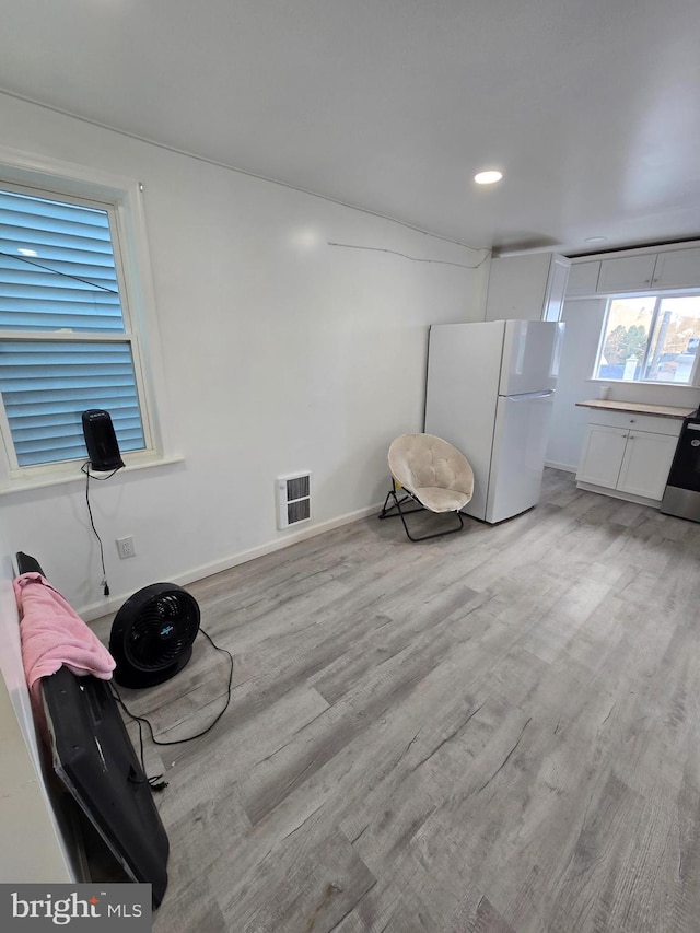 325 W Washington St, Tamaqua, PA 18252 - interior space with visible vents, baseboards, and light wood-style flooring