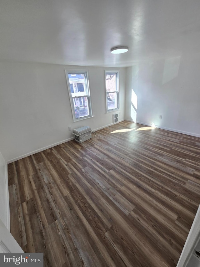 325 W Washington St, Tamaqua, PA 18252 - interior space with visible vents, baseboards, and dark wood-style flooring