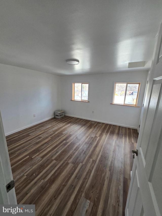 325 W Washington St, Tamaqua, PA 18252 - spare room with dark wood-style floors and baseboards