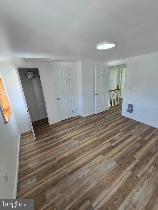 325 W Washington St, Tamaqua, PA 18252 - spare room with visible vents, baseboards, and wood finished floors