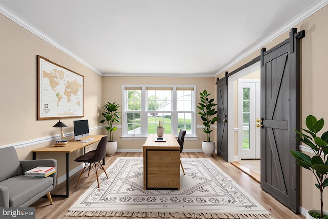 11 Ashbrook Rd, Stafford, VA 22554 - home office featuring a barn door, light wood-type flooring, crown molding, and baseboards