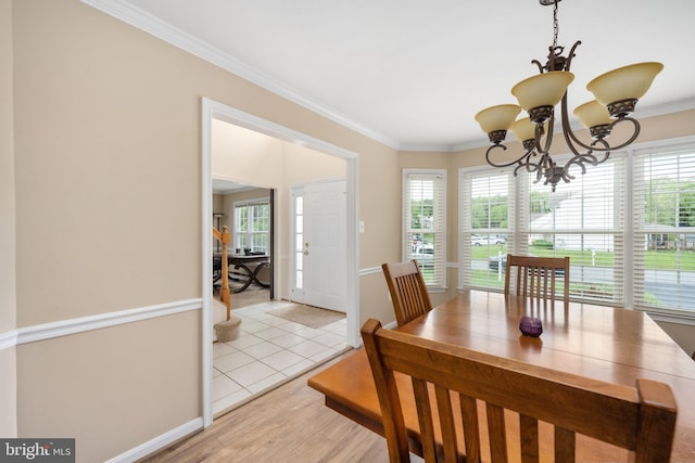 11 Ashbrook Rd, Stafford, VA 22554 - dining area with ornamental molding, a chandelier, light wood-style floors, and baseboards