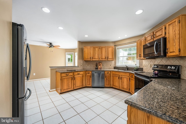11 Ashbrook Rd, Stafford, VA 22554 - kitchen featuring stainless steel microwave, dishwasher, freestanding refrigerator, electric stove, and a peninsula