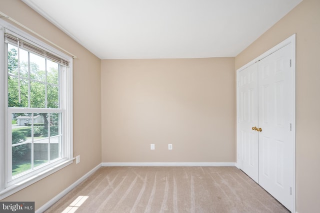 11 Ashbrook Rd, Stafford, VA 22554 - unfurnished bedroom with multiple windows, baseboards, and light colored carpet