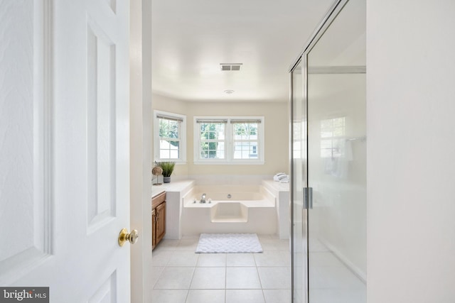 11 Ashbrook Rd, Stafford, VA 22554 - full bath with tile patterned floors, a stall shower, a bath, and vanity