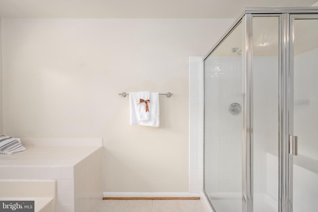 11 Ashbrook Rd, Stafford, VA 22554 - full bathroom with a shower stall, tile patterned floors, and baseboards