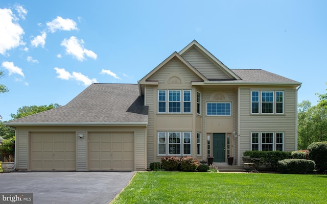 11 Ashbrook Rd, Stafford, VA 22554 - view of front of house with an attached garage, a front lawn, asphalt driveway, and a shingled roof