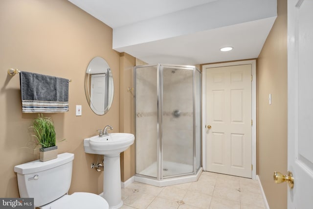 11 Ashbrook Rd, Stafford, VA 22554 - bathroom with baseboards, a shower stall, tile patterned flooring, and toilet