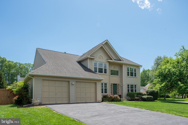 11 Ashbrook Rd, Stafford, VA 22554 - view of front facade with a garage, asphalt driveway, and a shingled roof