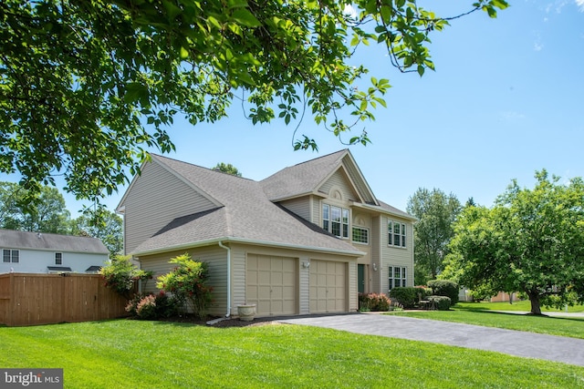 11 Ashbrook Rd, Stafford, VA 22554 - view of front of home featuring an attached garage, asphalt driveway, and a shingled roof
