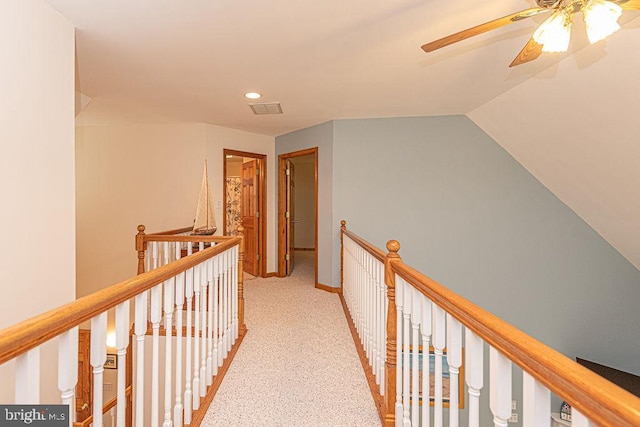 corridor with recessed lighting, carpet, baseboards, visible vents, and an upstairs landing