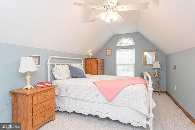 bedroom with lofted ceiling, baseboards, a ceiling fan, and carpet floors