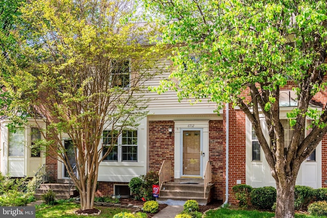 multi unit property featuring brick siding