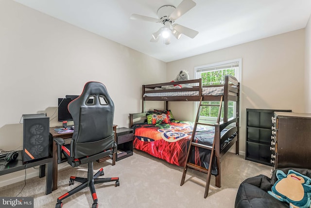 bedroom featuring a ceiling fan, carpet flooring, and baseboards