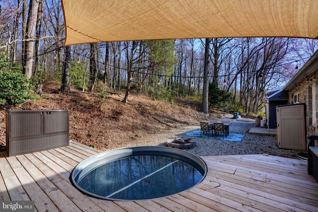 wooden deck with outdoor dining area