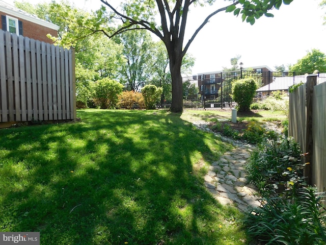 view of yard featuring fence