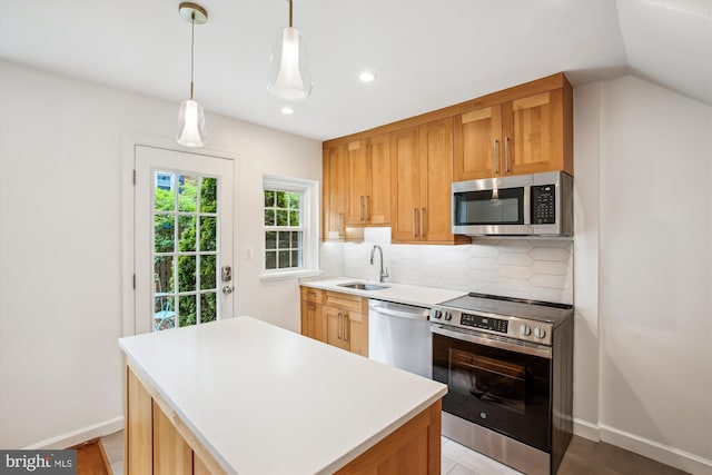 2858 S Abingdon St, Arlington, VA 22206 - kitchen featuring appliances with stainless steel finishes, a sink, backsplash, a center island, and baseboards