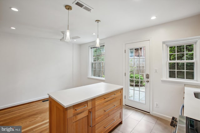 2858 S Abingdon St, Arlington, VA 22206 - kitchen featuring baseboards, pendant lighting, light countertops, recessed lighting, and ceiling fan
