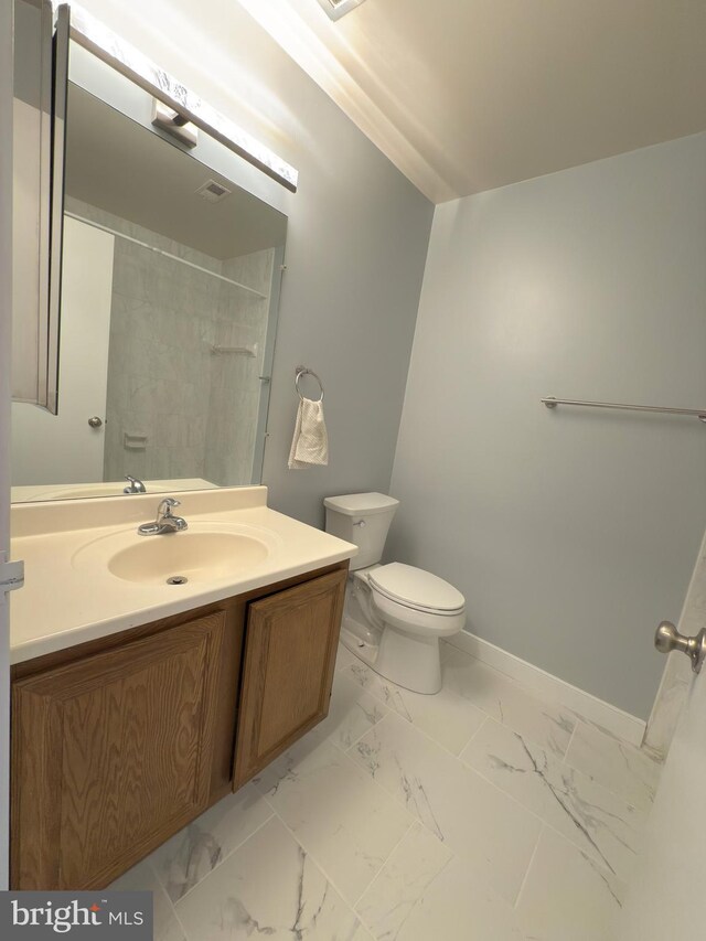 1415 Northgate Sq Unit 15/21B, Reston, VA 20190 - full bathroom with vanity, visible vents, marble finish floor, a shower, and toilet