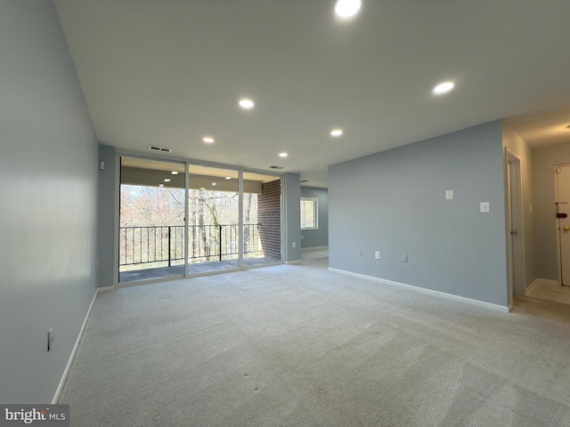 1415 Northgate Sq Unit 15/21B, Reston, VA 20190 - empty room featuring baseboards, visible vents, recessed lighting, and light colored carpet