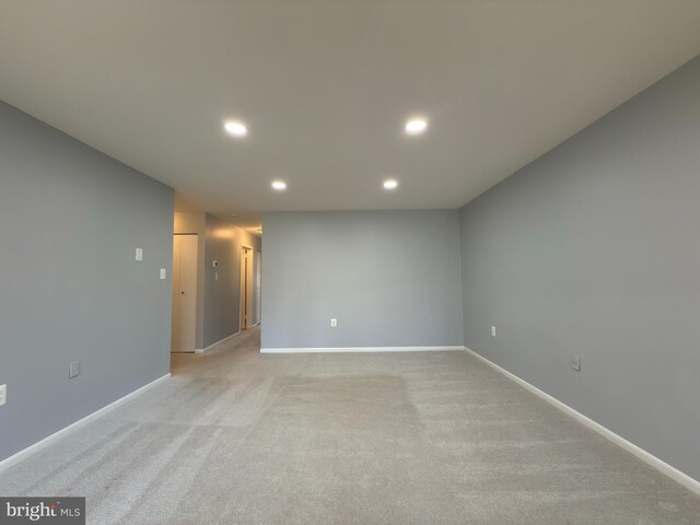 1415 Northgate Sq Unit 15/21B, Reston, VA 20190 - empty room with baseboards, light carpet, and recessed lighting
