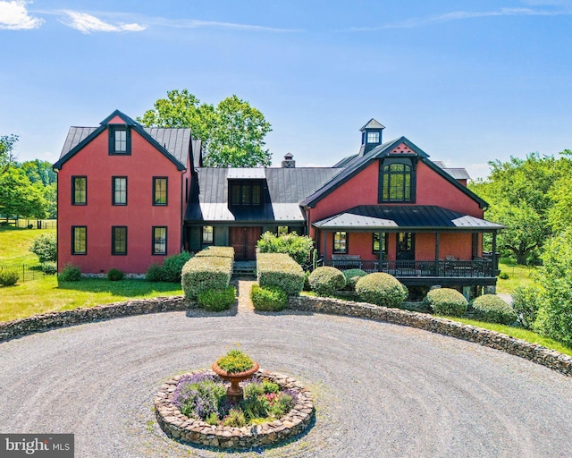 9425 Blackpond Ln, Delaplane, VA 20144 - view of front facade featuring a standing seam roof, metal roof, a porch, and curved driveway