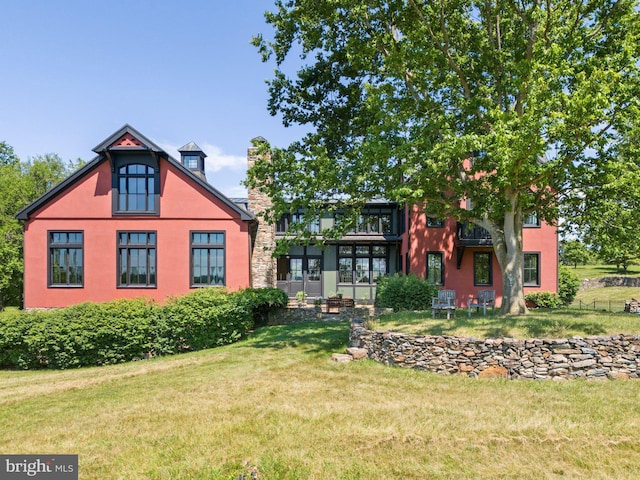 9425 Blackpond Ln, Delaplane, VA 20144 - rear view of house with a lawn, a chimney, and stucco siding