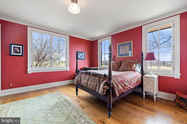 9425 Blackpond Ln, Delaplane, VA 20144 - bedroom featuring hardwood / wood-style floors, crown molding, and baseboards