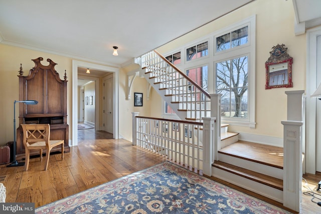 9425 Blackpond Ln, Delaplane, VA 20144 - stairs featuring wood finished floors and crown molding
