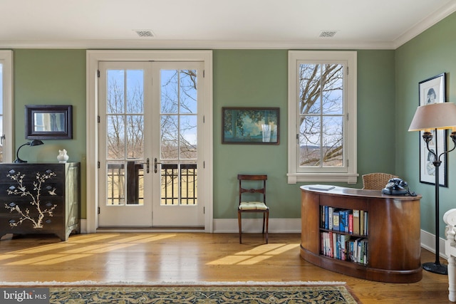 9425 Blackpond Ln, Delaplane, VA 20144 - entryway featuring wood finished floors, french doors, baseboards, crown molding, and plenty of natural light