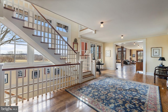 9425 Blackpond Ln, Delaplane, VA 20144 - entryway with hardwood / wood-style flooring, french doors, stairs, baseboards, and crown molding