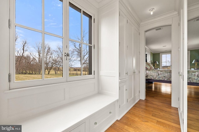 9425 Blackpond Ln, Delaplane, VA 20144 - mudroom with light wood-style flooring and crown molding