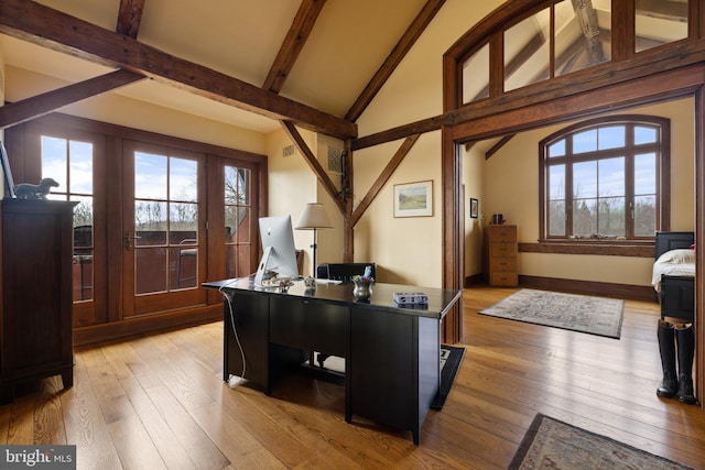 9425 Blackpond Ln, Delaplane, VA 20144 - office space featuring light wood-style floors, beamed ceiling, high vaulted ceiling, and baseboards