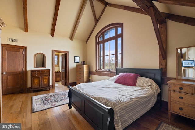 9425 Blackpond Ln, Delaplane, VA 20144 - bedroom featuring high vaulted ceiling, hardwood / wood-style flooring, and beamed ceiling
