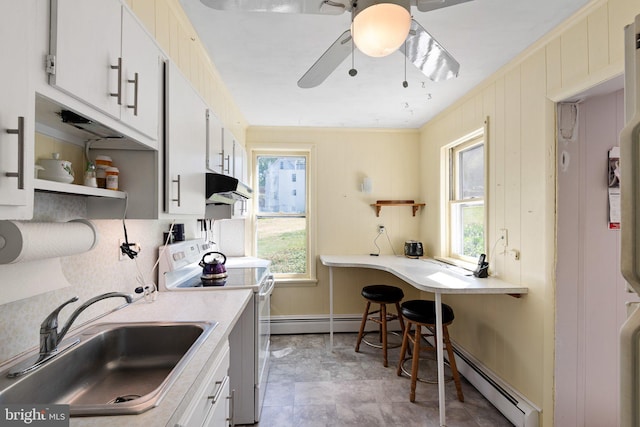 136 Landenberg Rd, Landenberg, PA 19350 - kitchen featuring white electric range oven, open shelves, a sink, a baseboard radiator, and under cabinet range hood