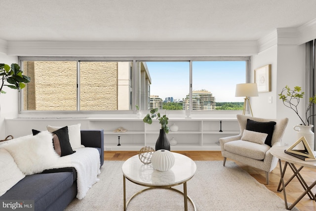 5500 Friendship Blvd Unit 2308N, Chevy Chase, MD 20815 - living area featuring wood finished floors, crown molding, and a city view