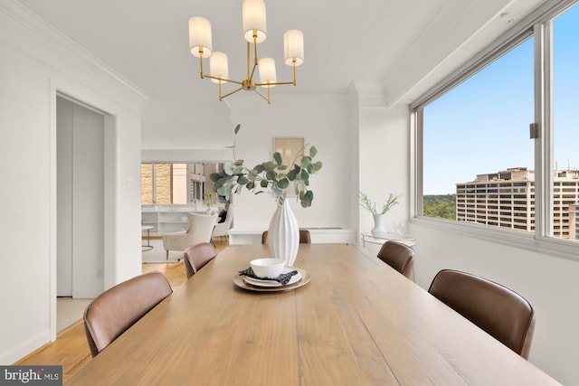5500 Friendship Blvd Unit 2308N, Chevy Chase, MD 20815 - dining room with a chandelier, crown molding, and wood finished floors