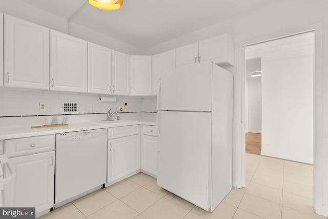 5500 Friendship Blvd Unit 2308N, Chevy Chase, MD 20815 - kitchen with white appliances, white cabinets, light tile patterned floors, and light countertops