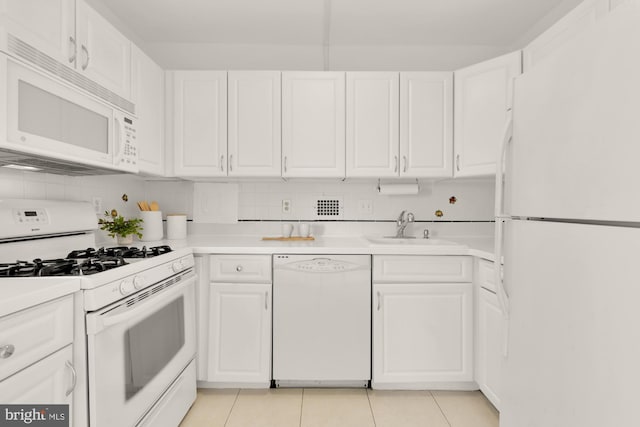 5500 Friendship Blvd Unit 2308N, Chevy Chase, MD 20815 - kitchen featuring white appliances, white cabinets, light tile patterned flooring, and light countertops