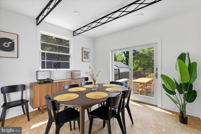 dining room with baseboards