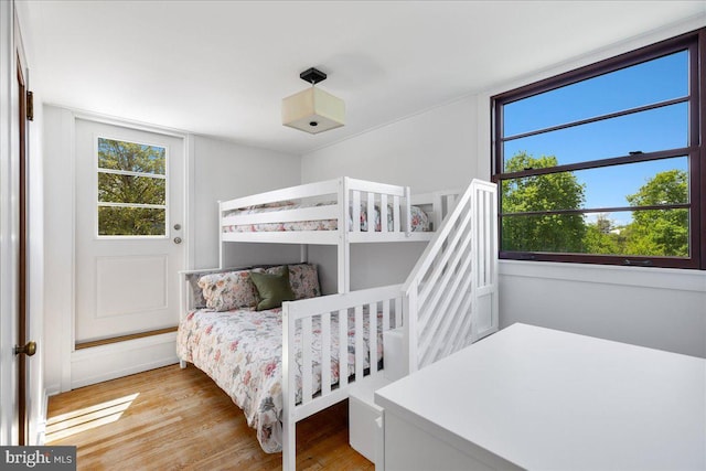 bedroom with light wood-style floors