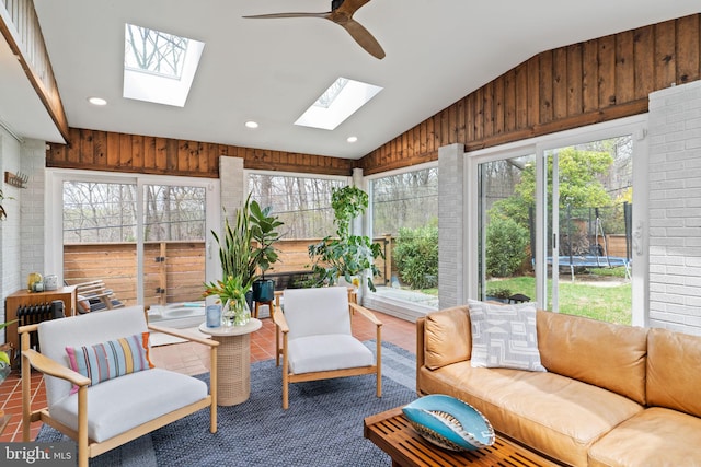 4600 Blagden Ter NW, Washington, DC 20011 - sunroom / solarium with vaulted ceiling, a skylight, plenty of natural light, wood walls, and recessed lighting
