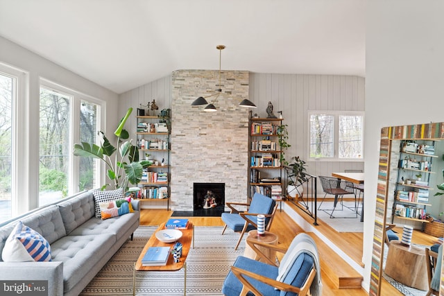 4600 Blagden Ter NW, Washington, DC 20011 - living area with vaulted ceiling, wood finished floors, and a fireplace