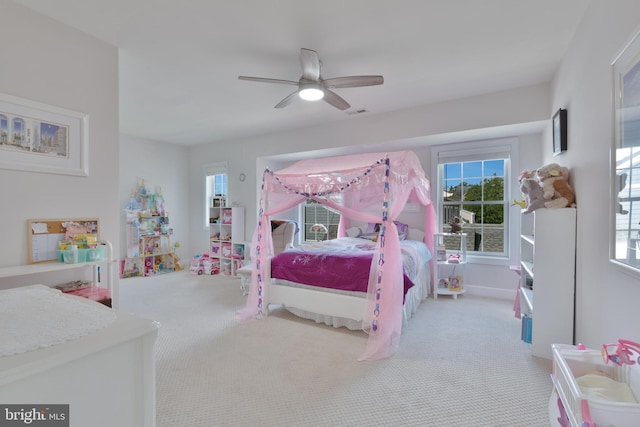 bedroom featuring carpet, visible vents, and ceiling fan