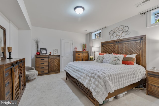 bedroom featuring carpet and visible vents